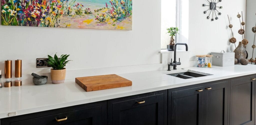 White Quartz Kitchen with Blue Cabinets 2